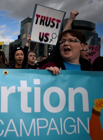 Demonstrators march for more liberal Irish abortion laws