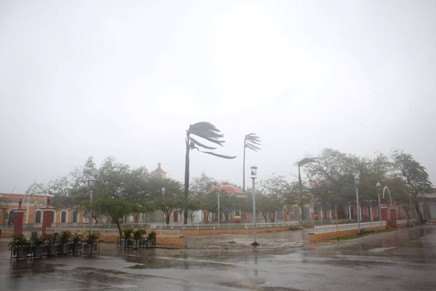 Trees sway in the wind at the main square as Hurricane Irma passes by Remedios