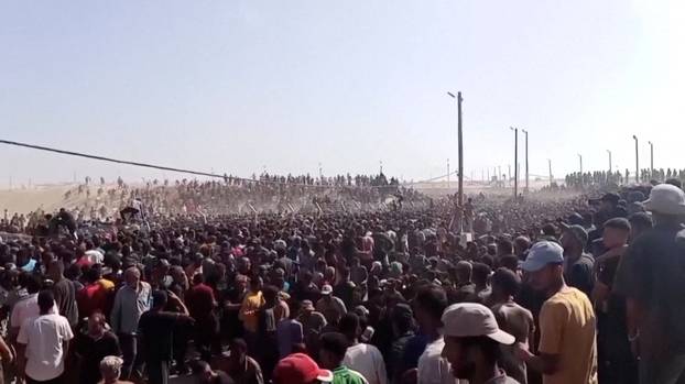 Palestinians rush to get aid boxes, in Rafah