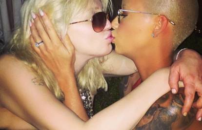  Nakon Madonne i Britney pao poljubac C. Love i Amber Rose