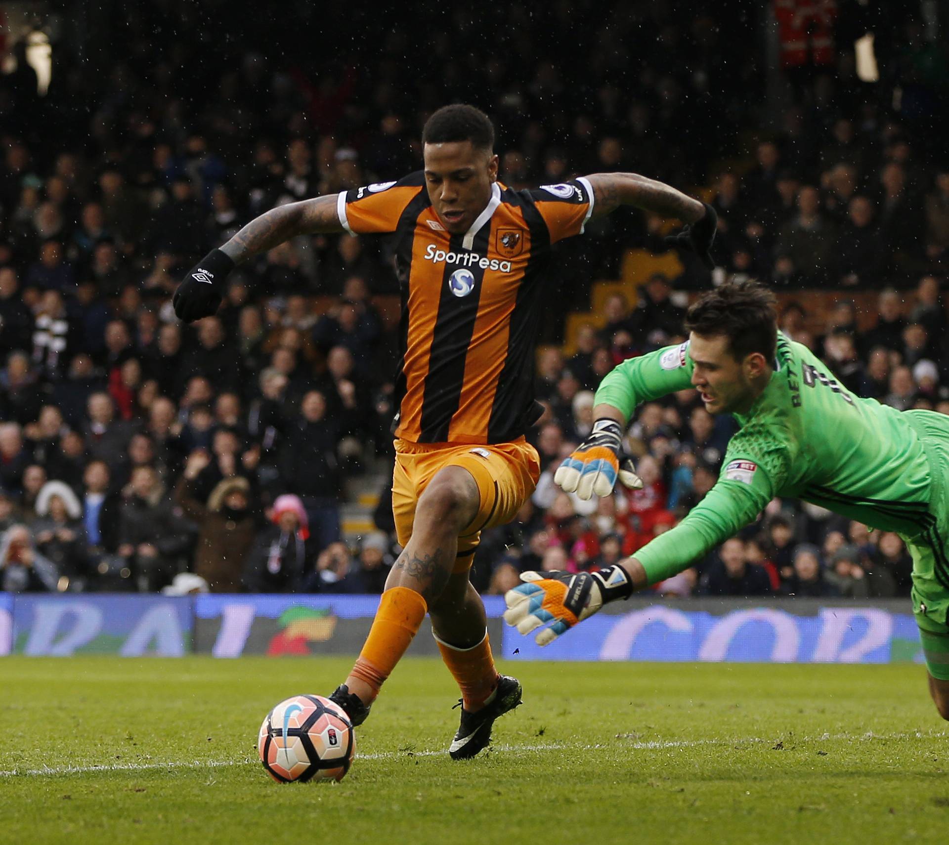 Fulham's Marcus Bettinelli fouls Hull City's Abel Hernandez and a penalty is awarded