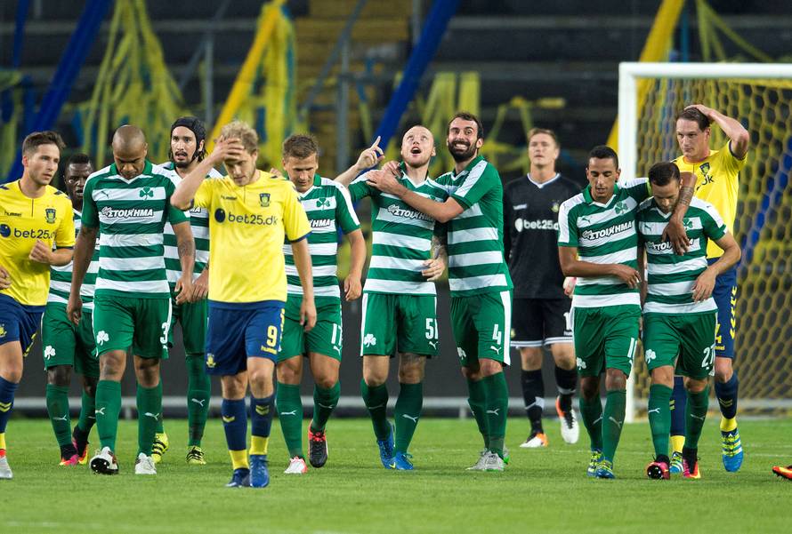 Panathinaikos players celebrate a goal during their Europe League second leg match against Brondby at Brondby Stadium in Brondby