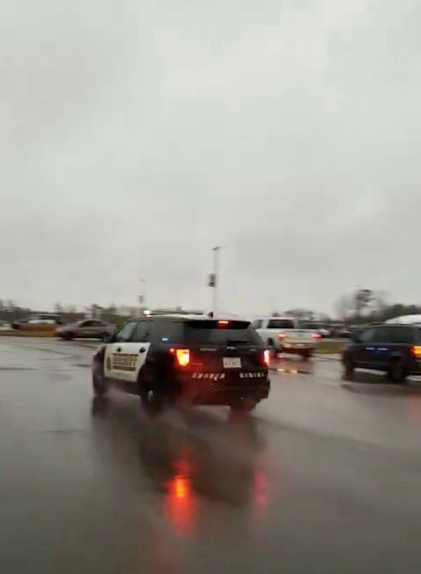 Law enforcement vehicle arrives at the Great Mills High School in Lexington Park