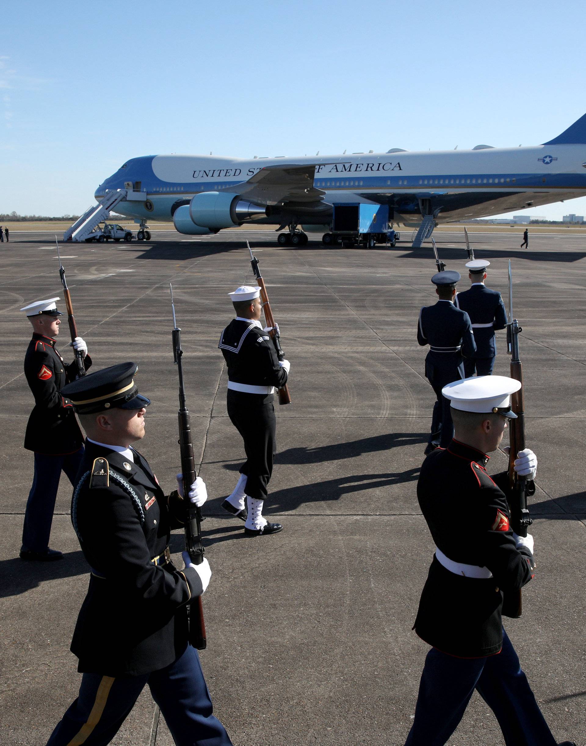 A military honor guard takes part in a departure ceremony honoring former President George H.W. Bush at Ellington Field Joint Reserve Base in Houston