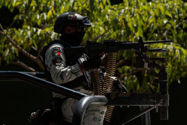 Mourners attend funeral for body believed to be ‘El Mencho’, in Zapopan