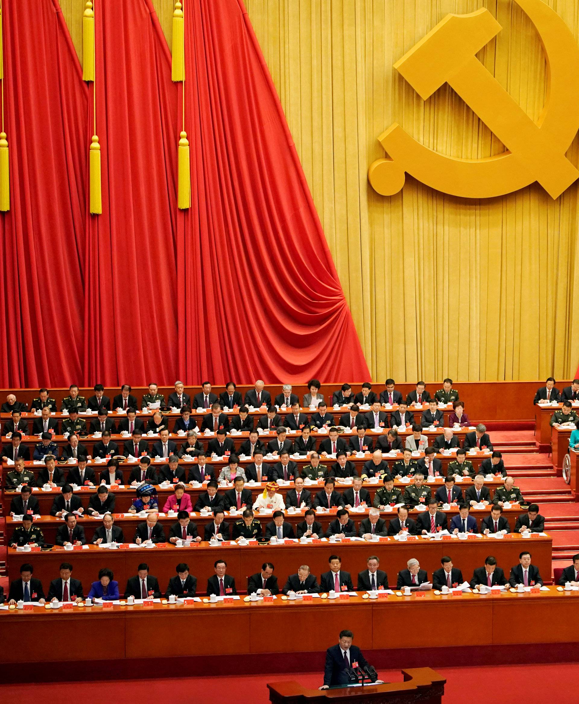 FILE PHOTO: Chinese President Xi Jinping speaks during the opening session of the 19th National Congress of the Communist Party of China at the Great Hall of the People in Beijing