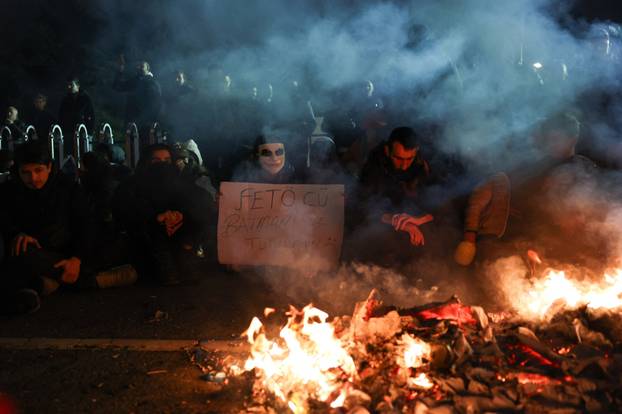 People take part in a protest against the detention of Istanbul Mayor Ekrem Imamoglu, in Istanbul