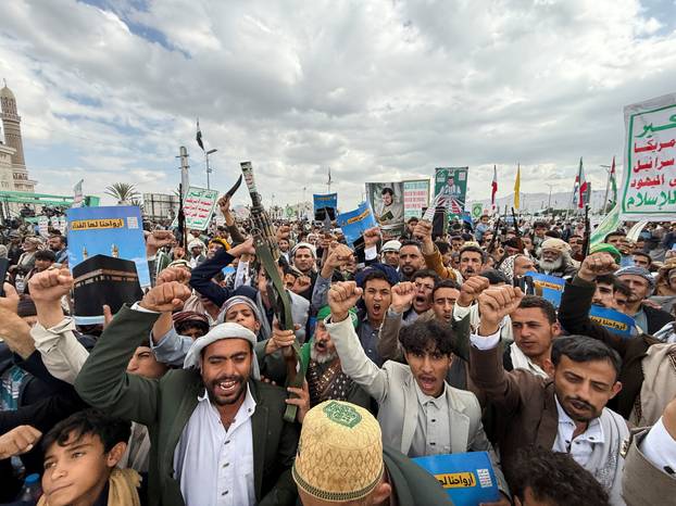 Houthi supporters rally to celebrate advances by Houthi forces along the Red Sea coastline, in Sanaa