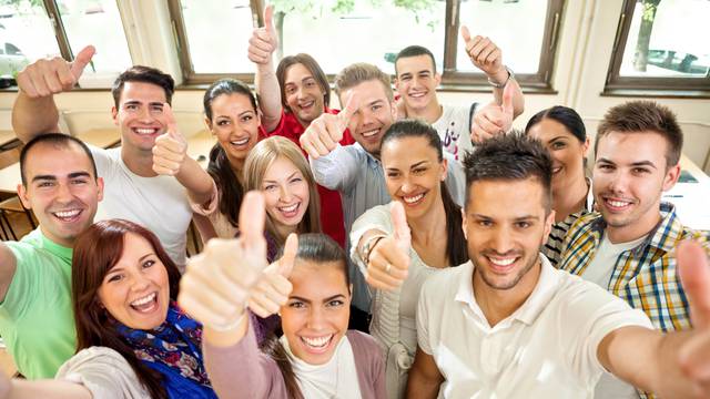 Group,Of,Happiness,Students,With,Raised,Hands