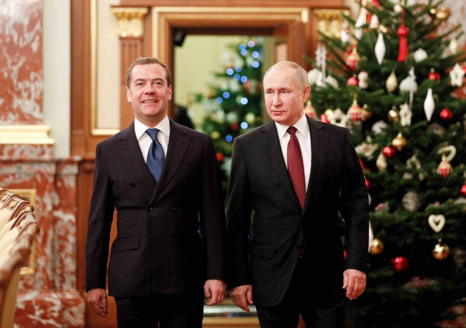 Russian President Putin and Prime Minister Medvedev attend a government meeting in Moscow