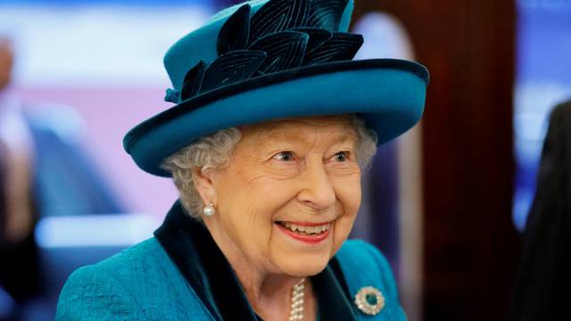 Britain's Queen Elizabeth visits the Royal Philatelic Society in London