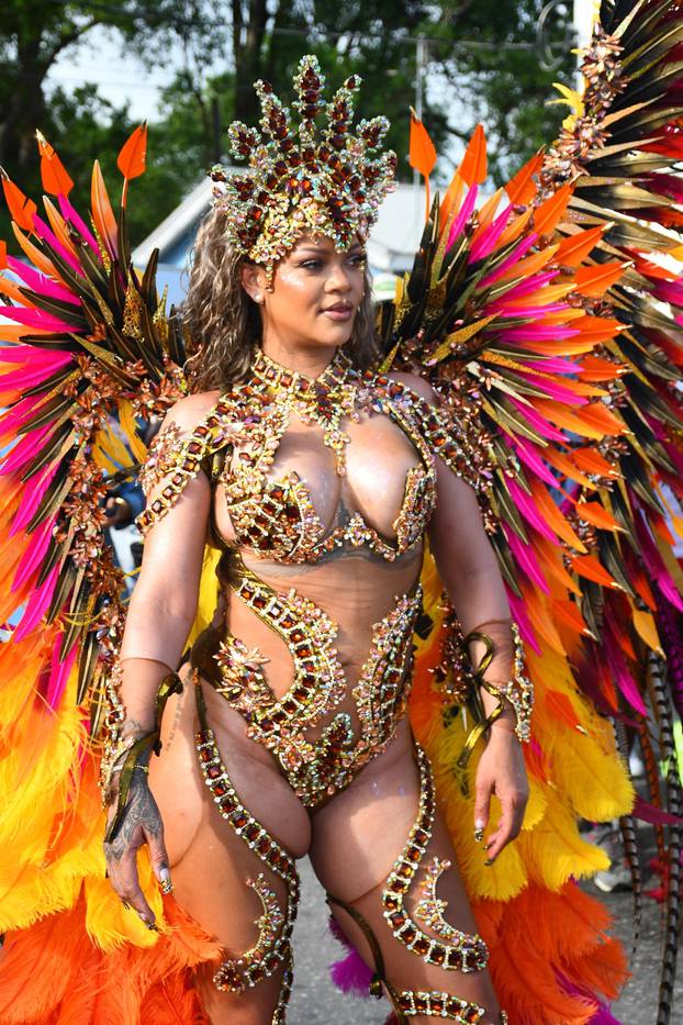 *EXCLUSIVE* Rihanna Dazzles in Bejeweled, Curve-Baring Carnival Costume