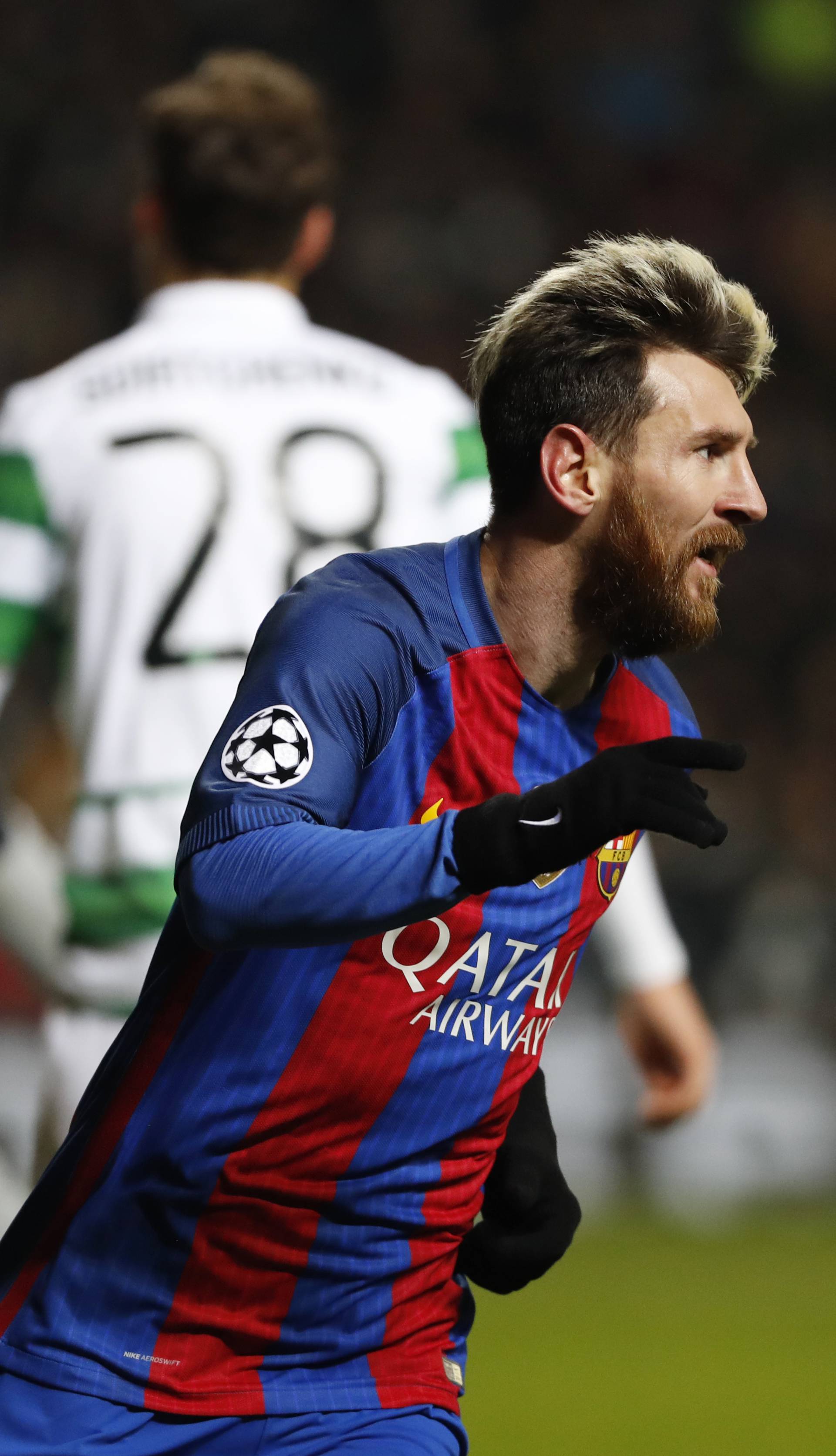Barcelona's Lionel Messi celebrates scoring their first goal