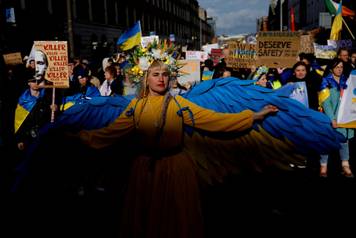Demonstrators mark the third anniversary of Russia's invasion of Ukraine, in Dublin