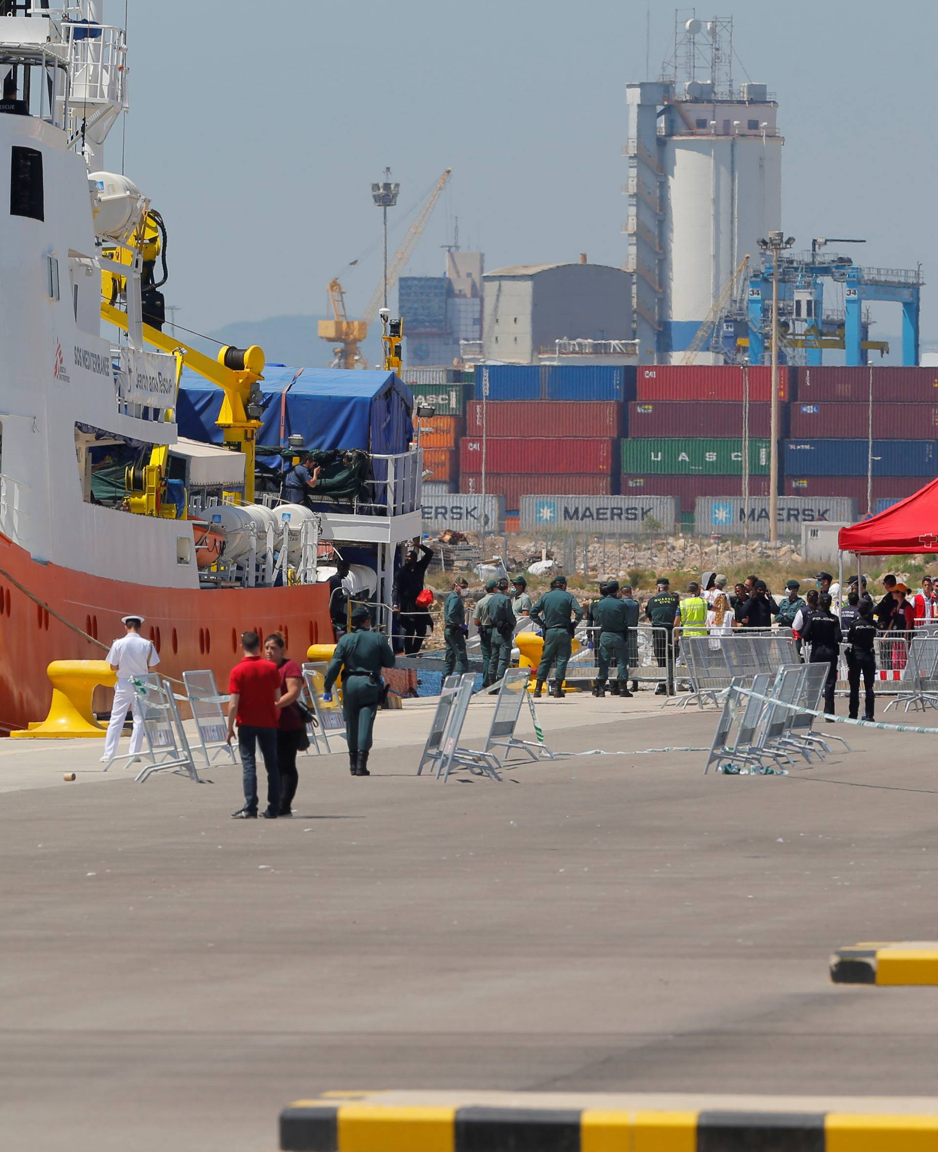 Refugees disembark the Aquarius rescue ship in the port in Valencia