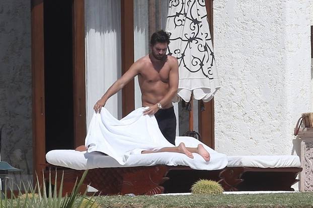 *EXCLUSIVE* Sofia Richie lounges topless with Scott Disick while on vacation