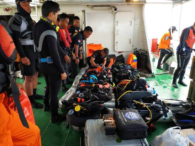 Social media image of divers preparing to set out for a search, days after Indonesia