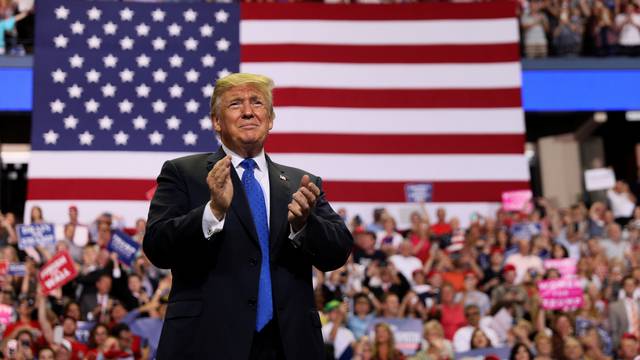 President Donald Trump rallies supporters during a Make America Great Again rally in Southaven Mississippi