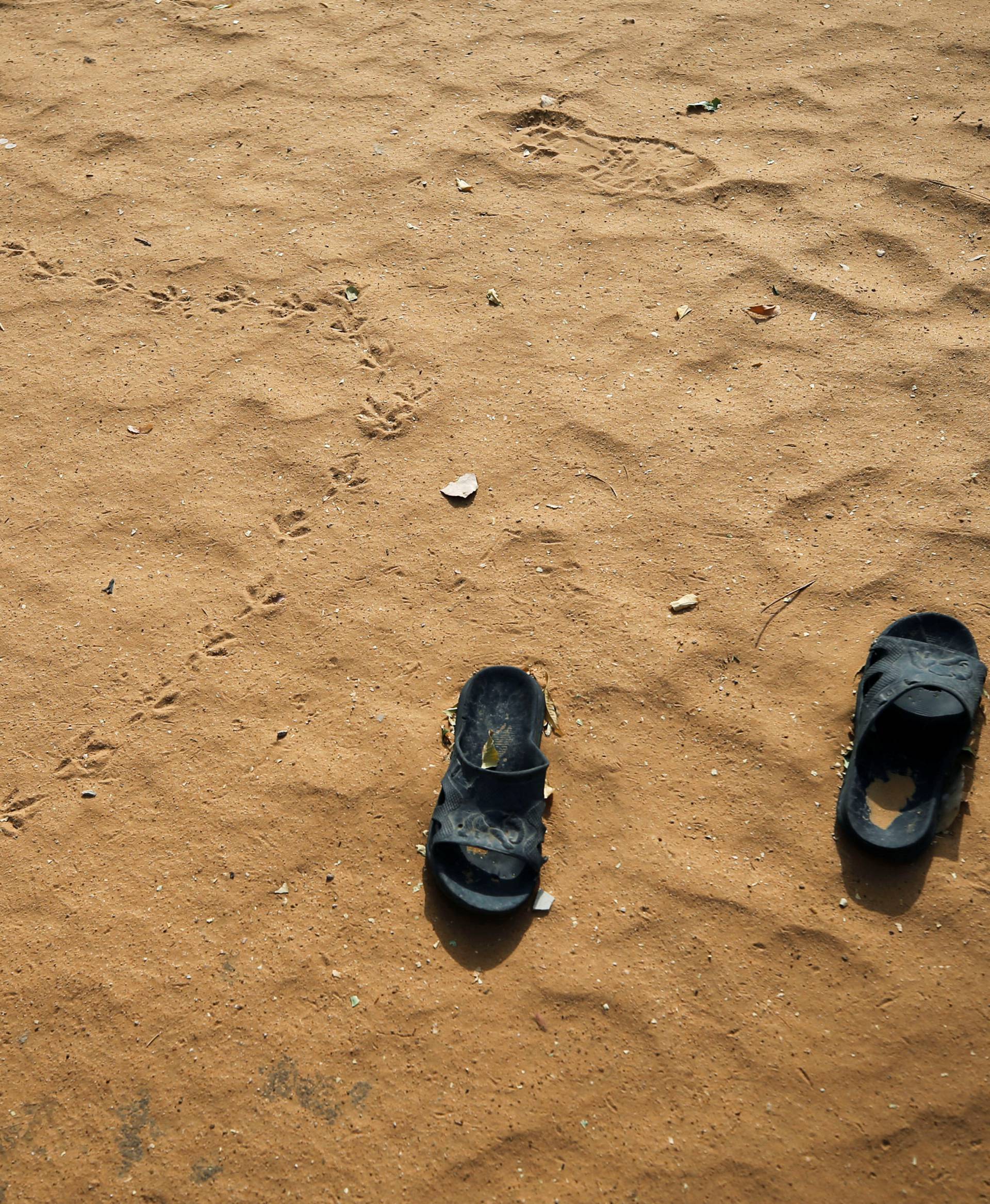 Slippers are pictured at the school compound in Dapchi in the northeastern state of Yobe, where dozens of school girls went missing after an attack on the village by Boko Haram
