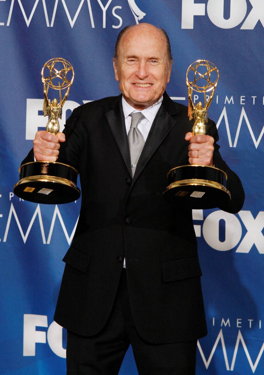 FILE PHOTO: Actor Robert Duvall holds the two Emmy awards he won in the 59th Primetime Emmy Awards in Los Angeles