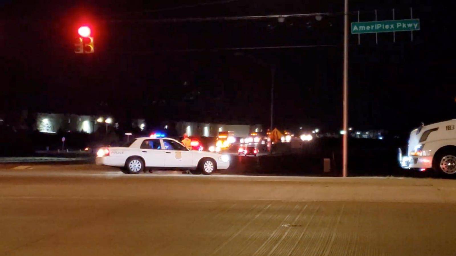 Police is seen at a street following a shooting incident at a FedEx facility in Indianapolis