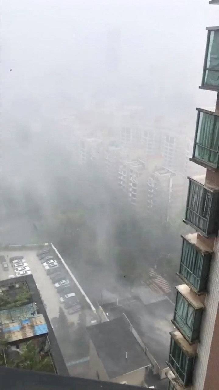 Heavy downpours is seen from an apartment as Typhoon Mangkhut approaches Shenzhen