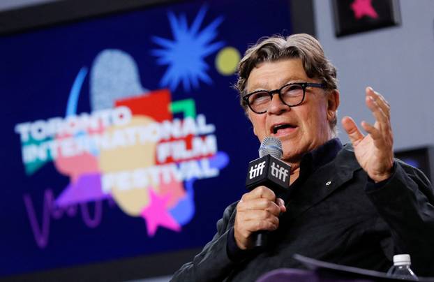 FILE PHOTO: Robbie Robertson, songwriting force in rock group The Band, dies at 80