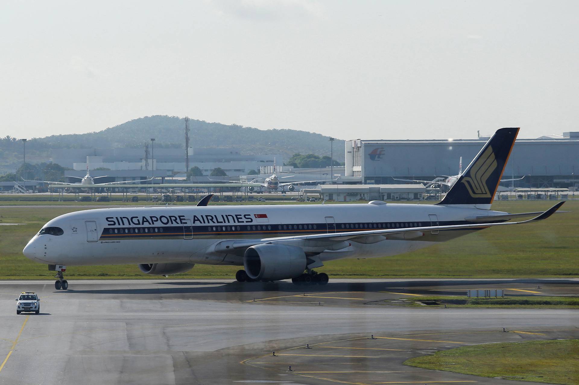 FILE PHOTO: Singapore Airlines plane lands at Kuala Lumpur International Airport under the Malaysia-Singapore Vaccinated Travel Lane programme, in Sepang