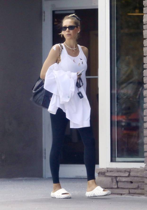 EXCLUSIVE: Anna Kournikova is Spotted on a Rare Outing in Miami Beach