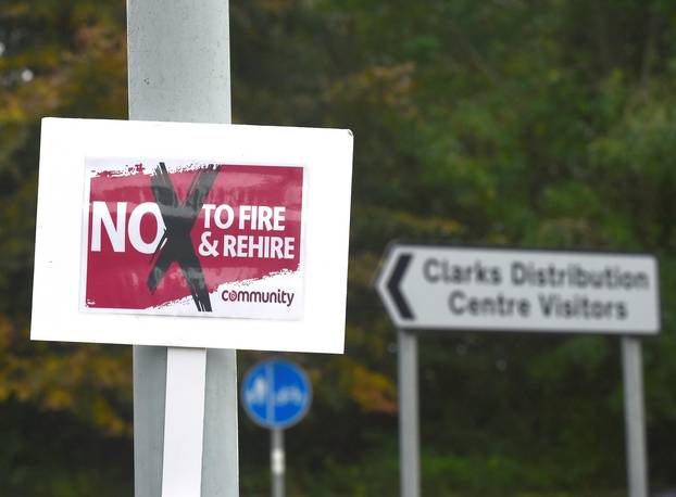 A striking worker sign is seen outside the Clarks distribution centre, in Street, Somerset