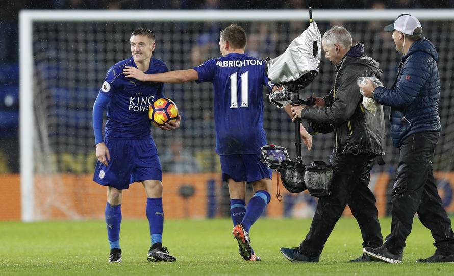 Leicester City's Jamie Vardy with the match ball at the end of the match after scoring a hat-trick