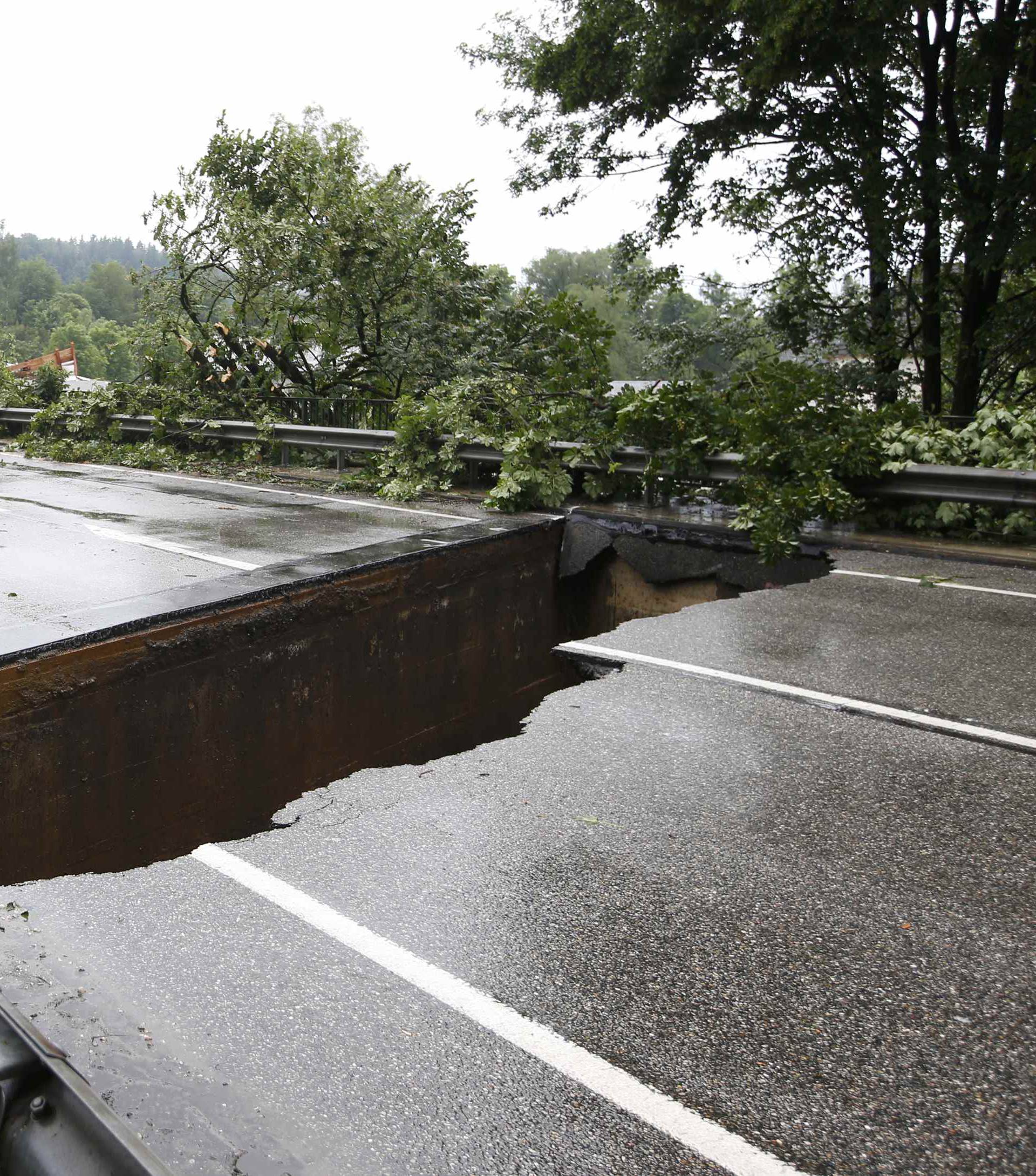 A bridge damaged by the floods is pictured in the small Bavarian village of Unterturken