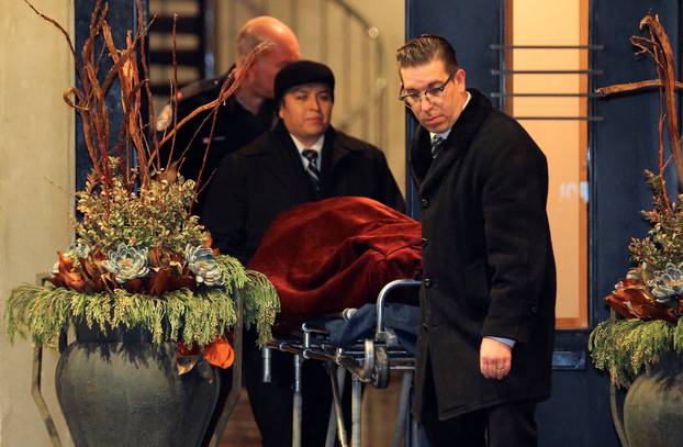 One of two bodies is removed from the home of billionaire founder of Canadian pharmaceutical firm Apotex in Toronto