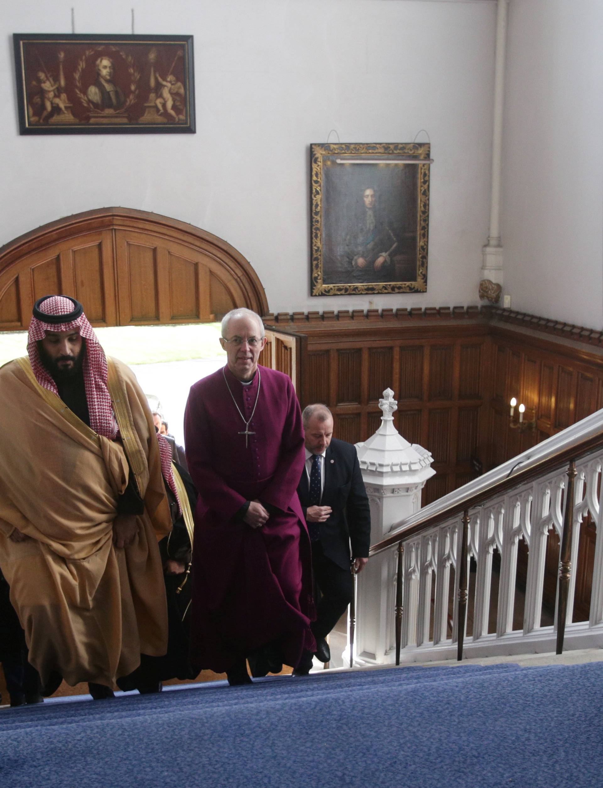 Britain's Archbishop of Canterbury Justin Welby accompanies The Crown Prince of Saudi Arabia Mohammed bin Salman for a private meeting at Lambeth Palace, London