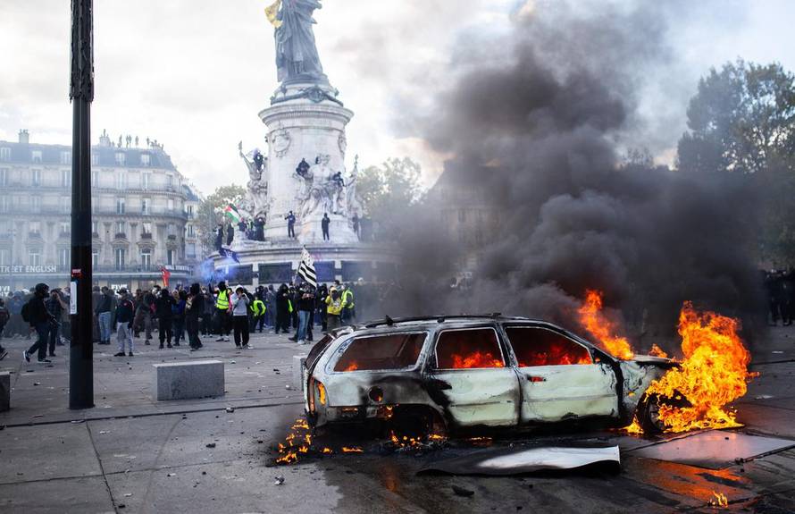 Police clash with protesters during demonstration in Paris