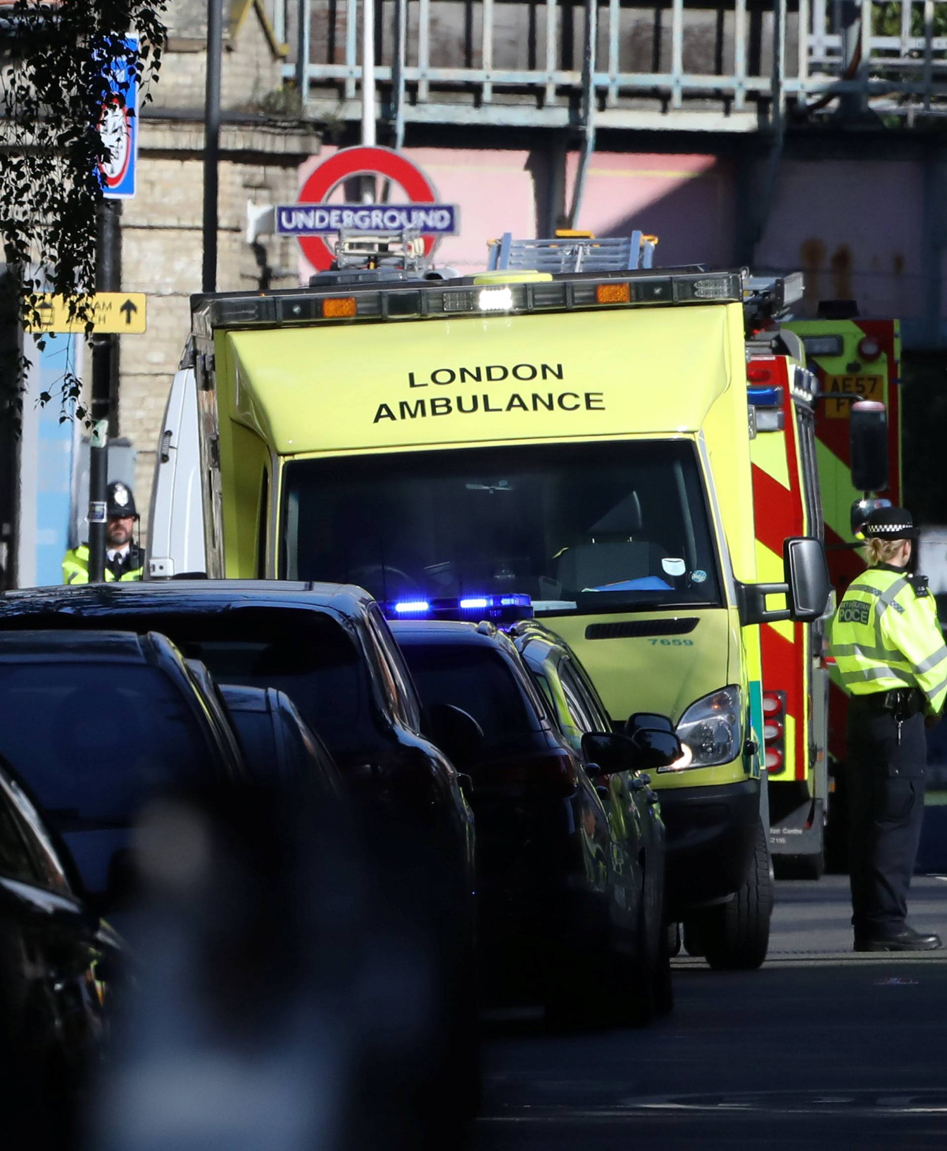 Police, fire and ambulance crew attend to an incident at Parsons Green underground station in London