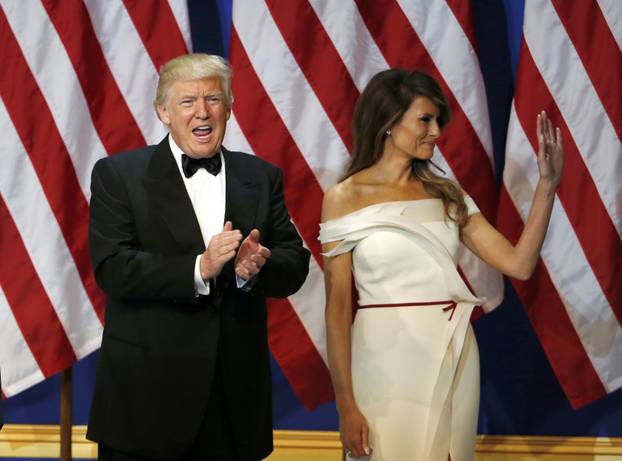 U.S. President Donald Trump and his wife first lady Melania Trump arrive at the "Salute to Our Armed Forces" inaugural ball during inauguration festivites in Washington