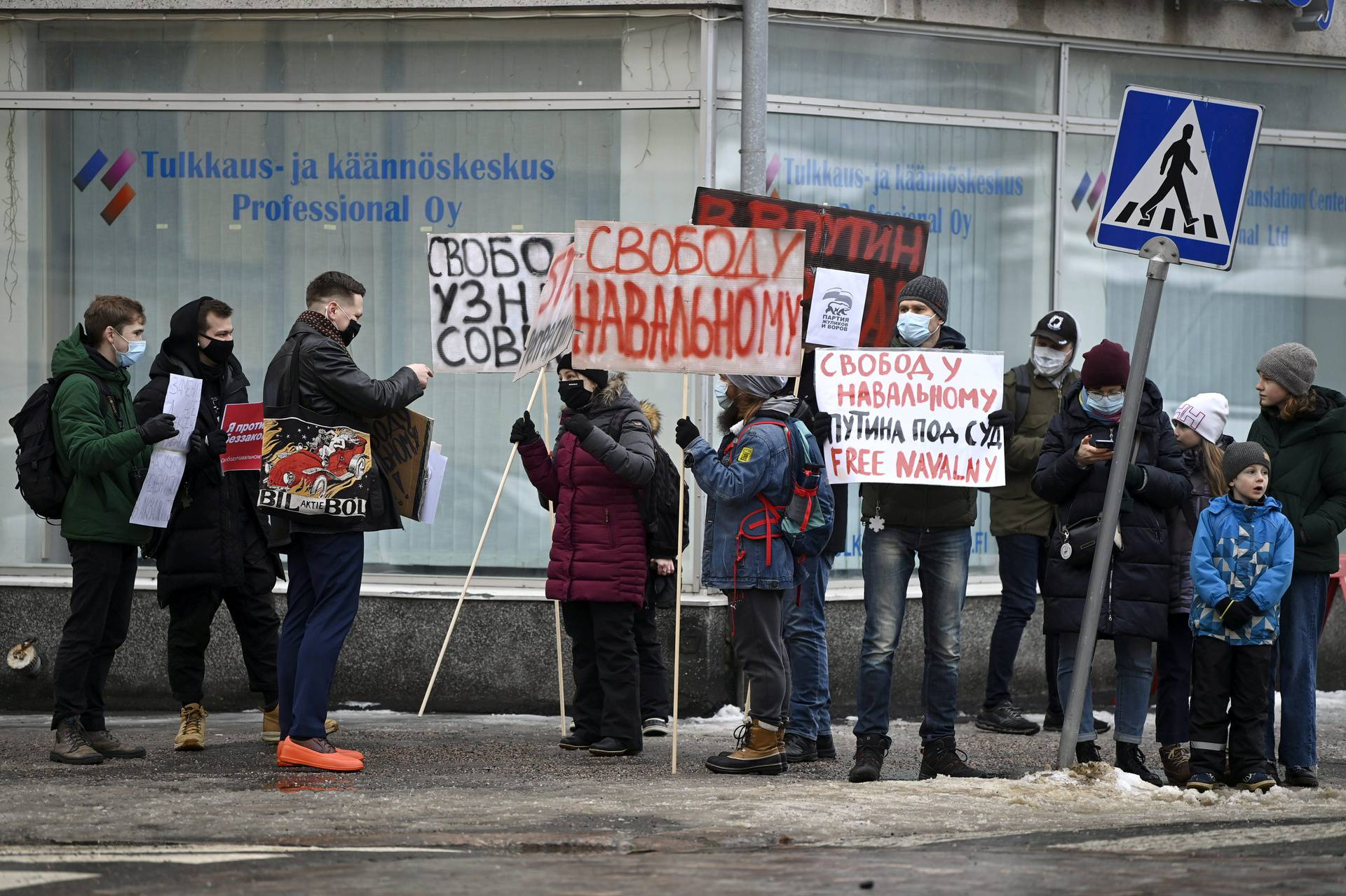 Demonstrators supporting jailed opposition leader Alexei Navalny in Helsinki