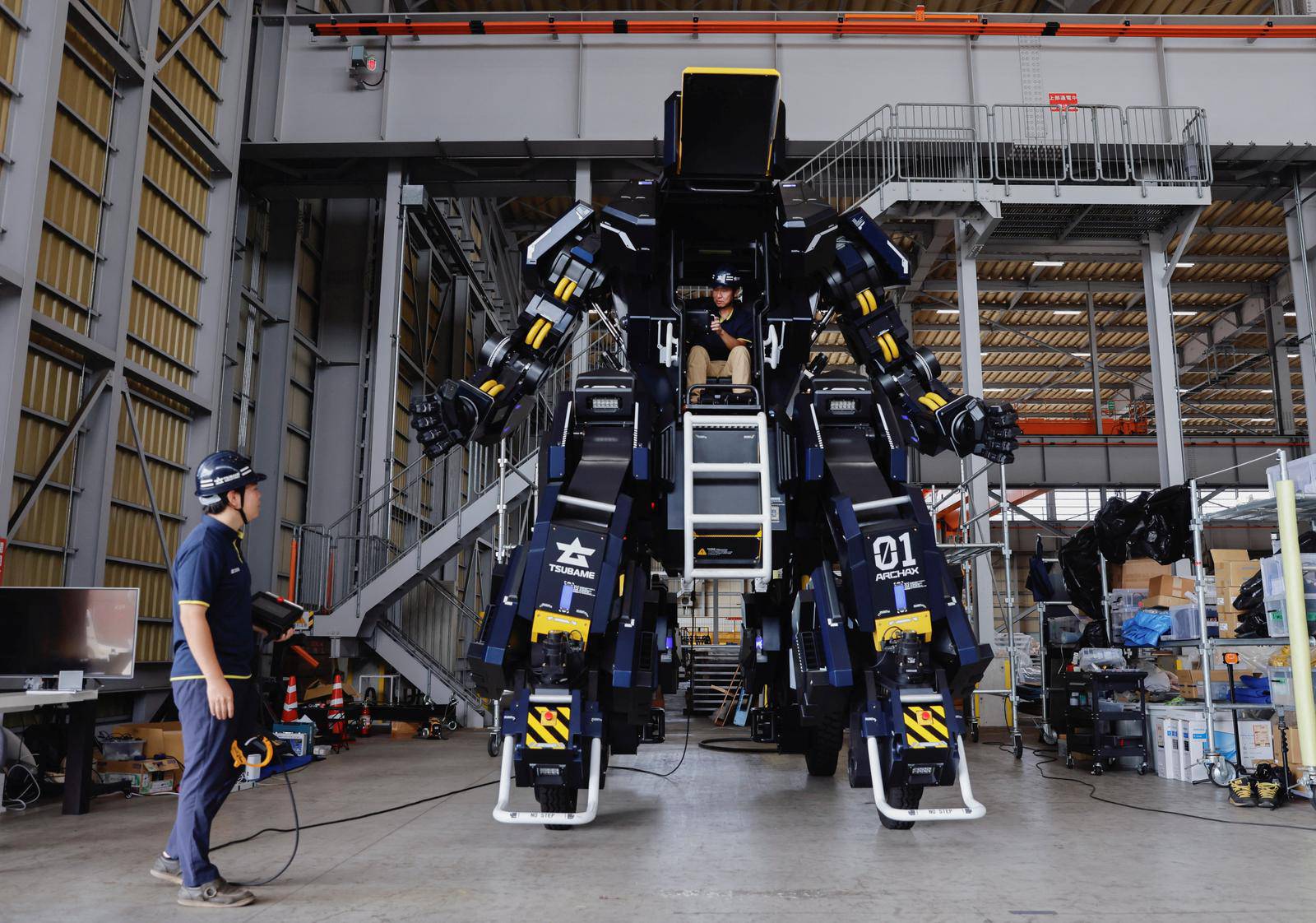 CEO Ryo Yoshida and CTO Akinori Ishii ARCHAX, a giant human-piloted robot, in Yokohama, Japan