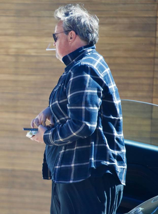 Exclusive - Matthew Perry Puffs on a Cigarette as he Steps out in Los Feliz, Los Angeles, California, USA - 28 Oct 2021