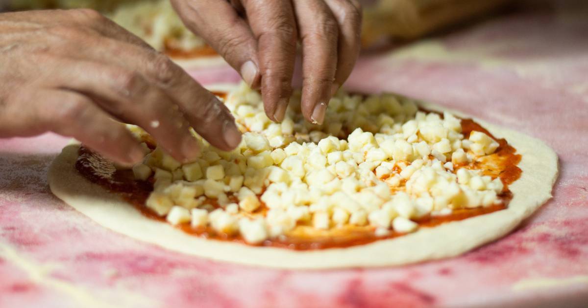 Setting a Guinness Record: Making Pizza with 1001 Types of Cheese and a Perfectly Cooked Dough