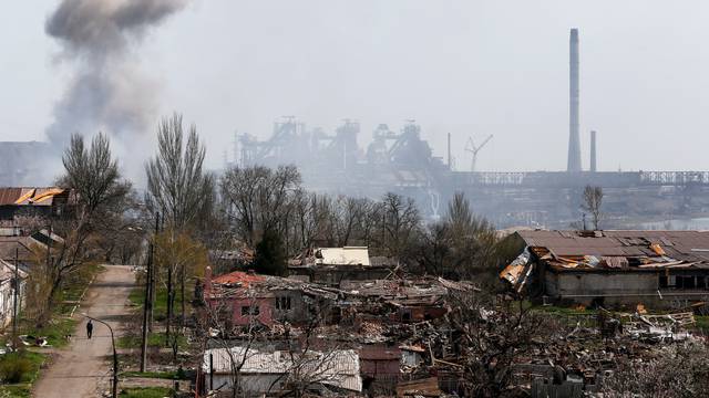 Smoke rises above a plant of Azovstal Iron and Steel Works company in Mariupol