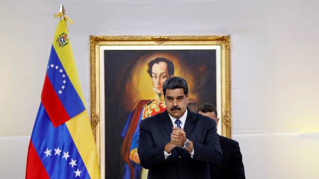 Venezuela's President Nicolas Maduro great the International observers for the upcoming May 20 election at the presidential palace in Caracas