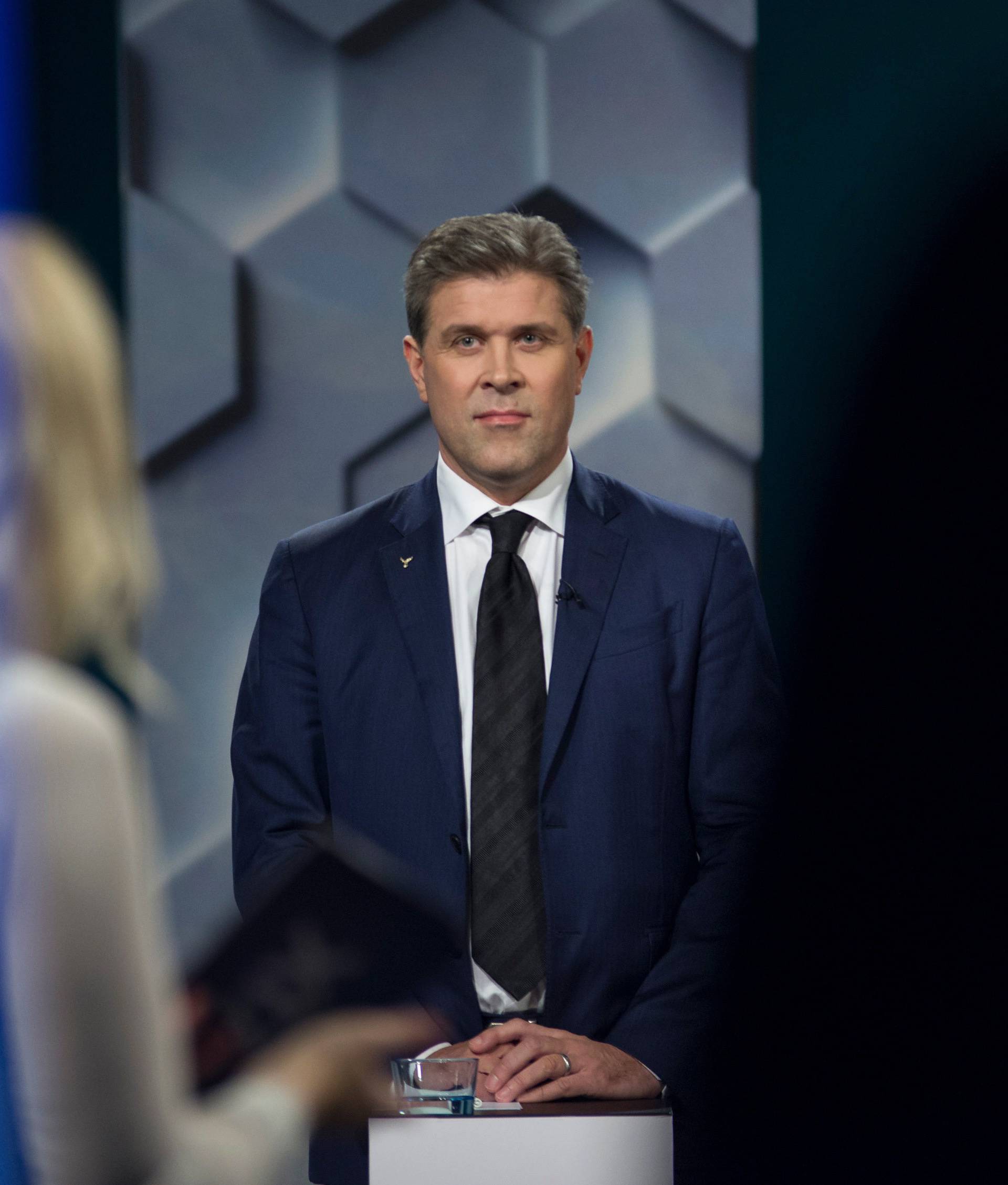Iceland's Independence Party candidate Benediktsson listens during television debate in Reykjavik