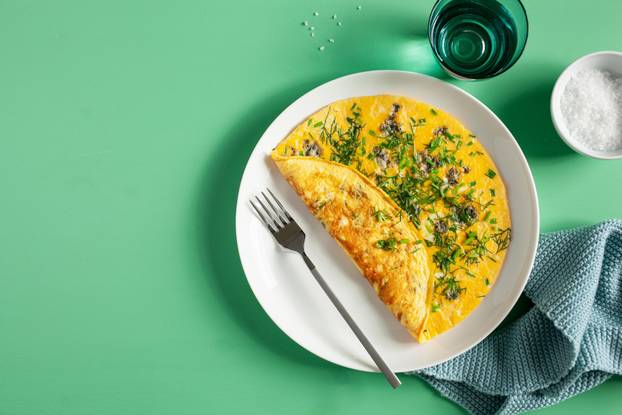 omelette with blue cheese herbs spring onion. healthy keto diet 