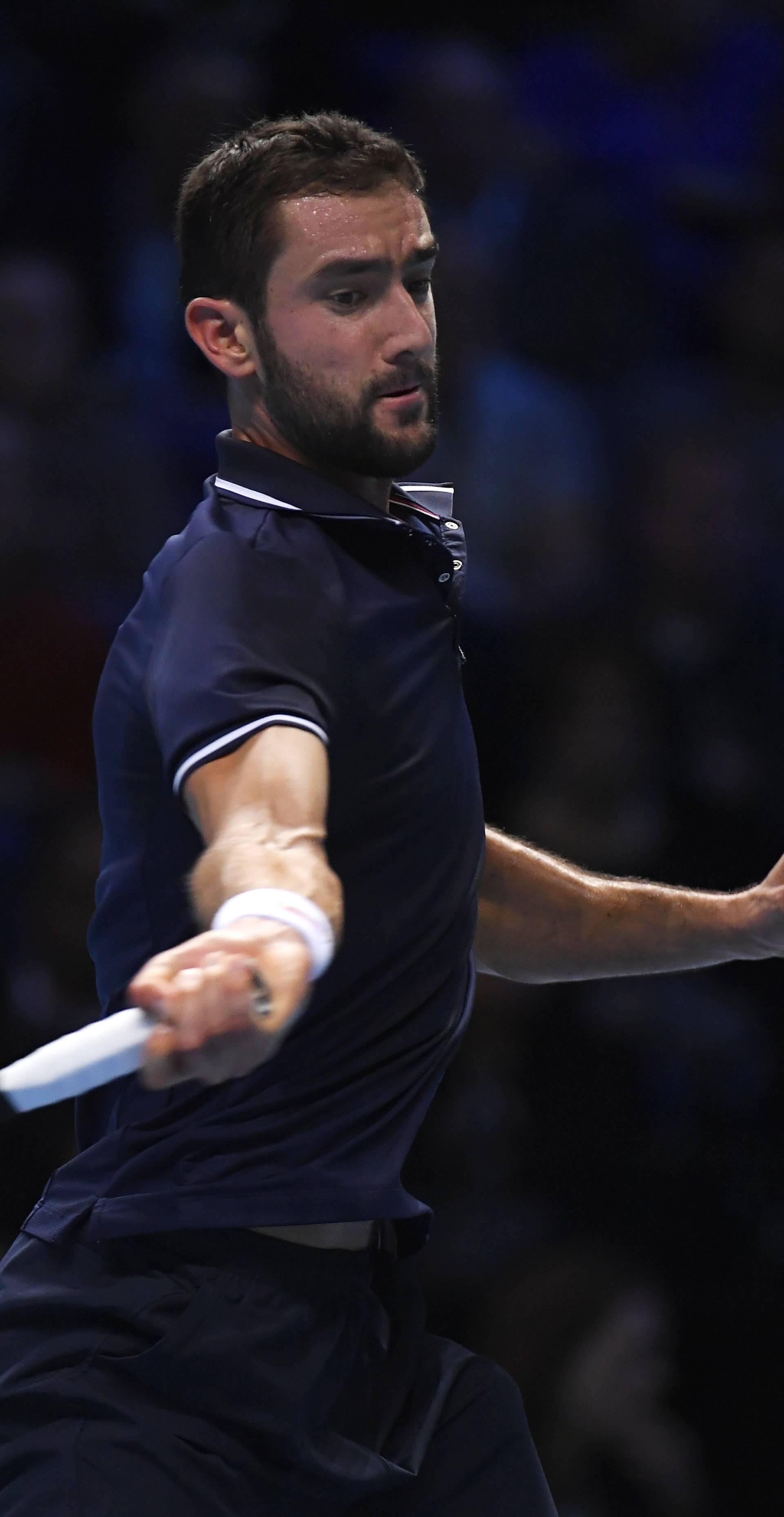 Croatia's Marin Cilic in action during his round robin match with Switzerland's Stanislas Wawrinka