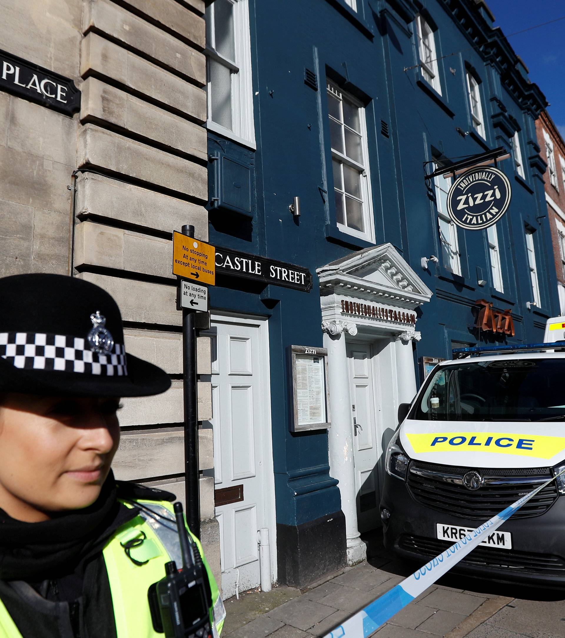 A police officer guards Zizzi's restaurant where Sergei Skripal and his daughter Yulia are known to have visited shortly before they were found in the centre of Salisbury