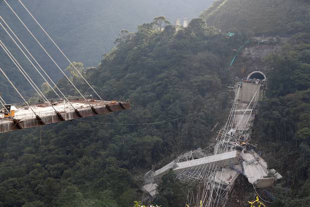 View of a bridge under construction that collapsed leaving dead and injured workers in Chirajara