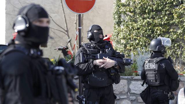 Members of special Police units RAID outside the Tocqueville high school after a shooting incident injuring at least eight people, in Grasse