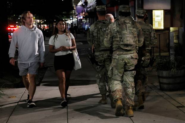 Members of the Ohio National Guard wear their sidearms while patrolling in Washington